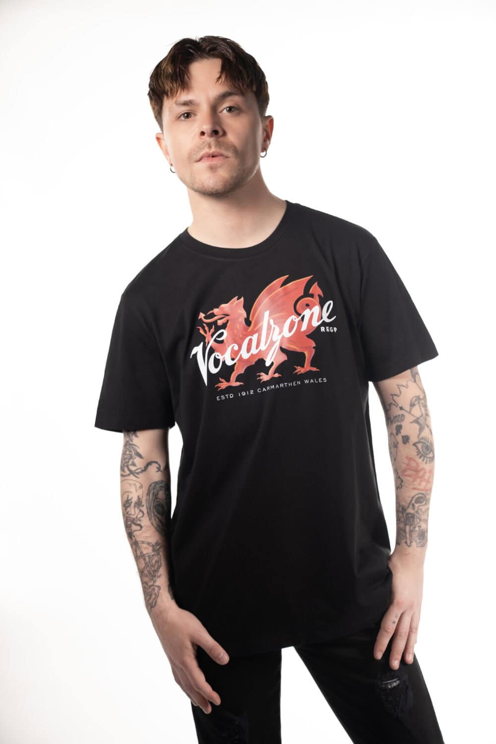 Vocalzone Welsh Heritage T-Shirt in black worn by a male model.
