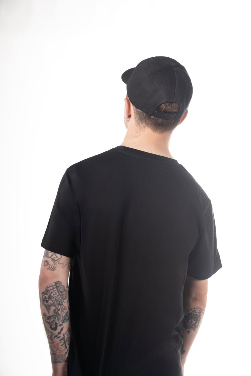 Reverse of Vocalzone Stealth T-Shirt worn by a male model.