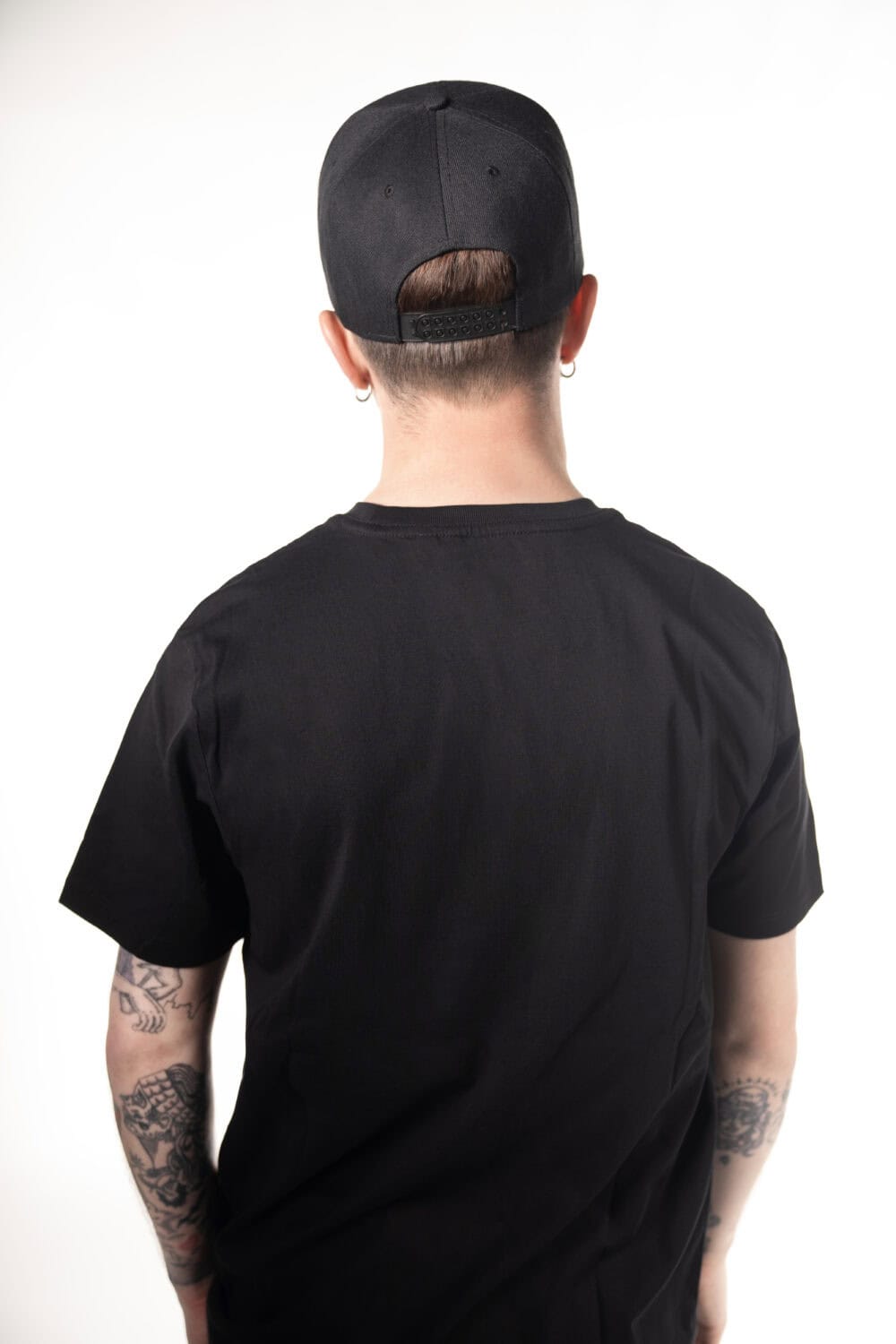 Vocalzone Modern Logo T-Shirt reverse worn by a male model.