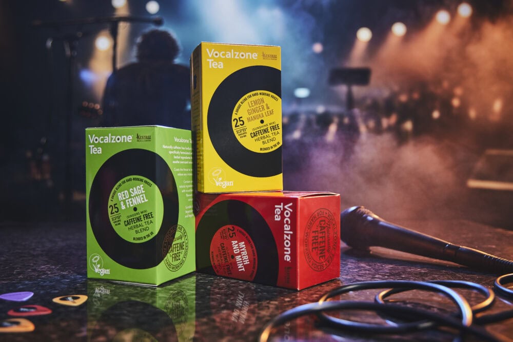 All 3 flavours of Vocalzone Tea on a stage.